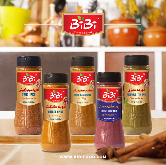 An array of BiBi Food’s Middle Eastern spices and herbs, featuring vibrant saffron, tangy sumac, aromatic za’atar, and rich cardamom, beautifully presented, enhancing natural culinary flavors